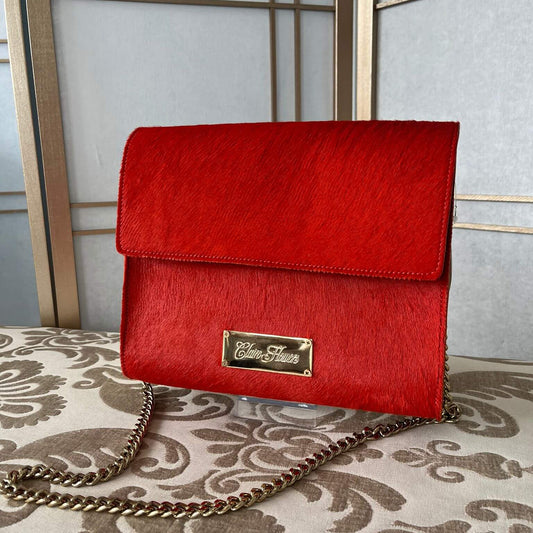 Red Pony Hair Clutch - High-impact style with functional elegance